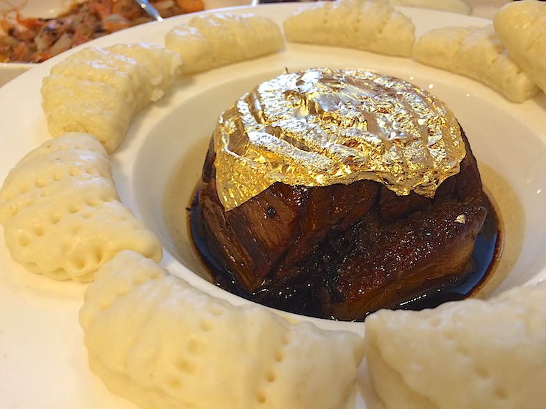 steamed pork with gold leaf