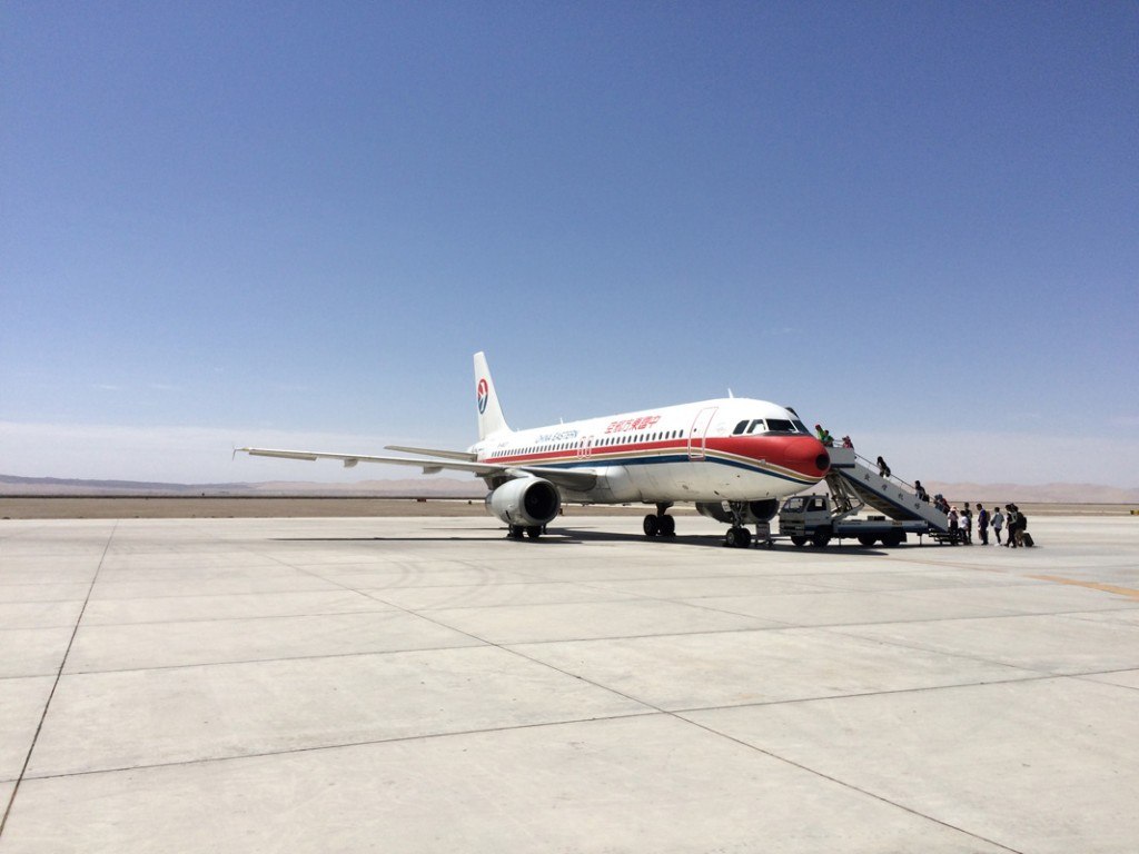 airplane on tarmac in Gobi Desert