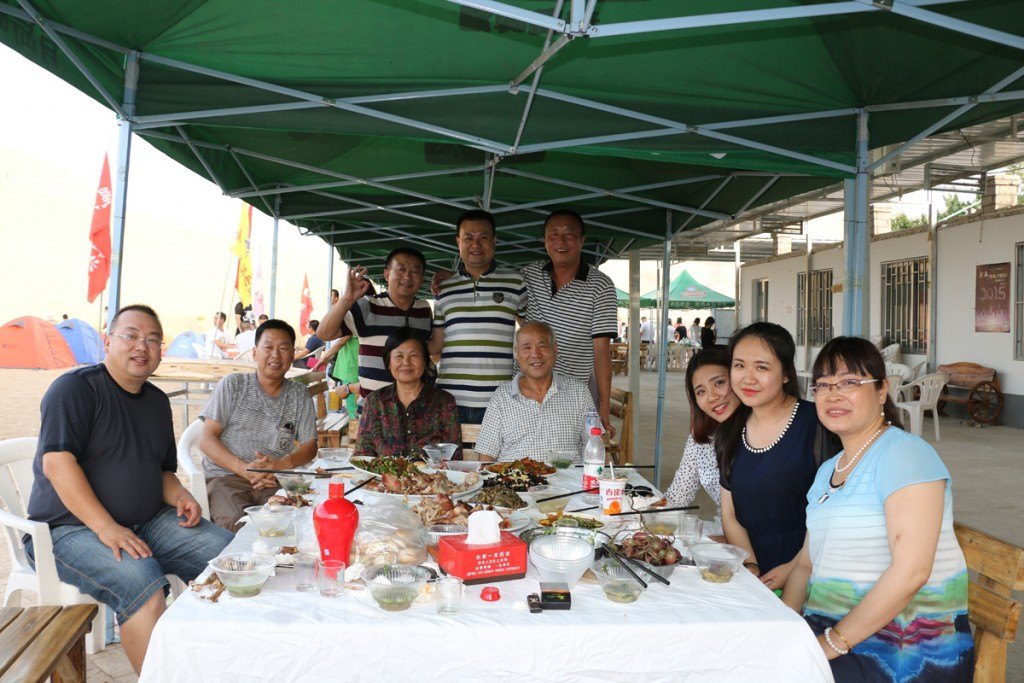 Family at campsite in Gobi Desert