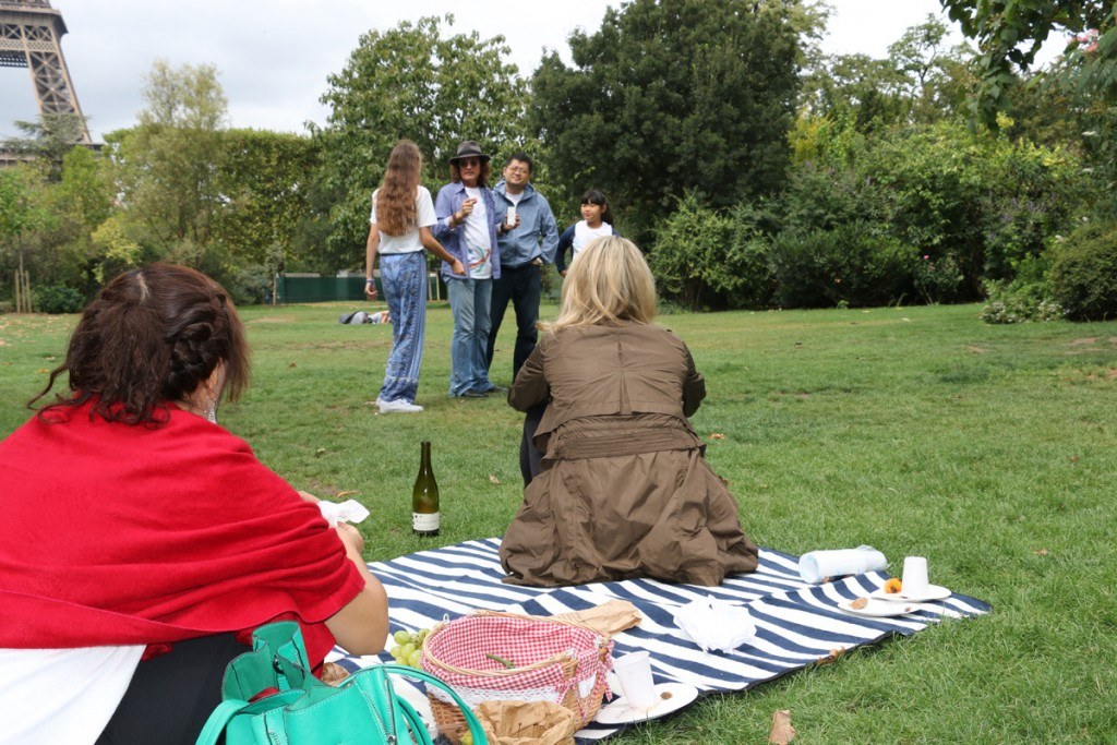 Picnic by Eiffel Tower by MikesRoadTrip.com