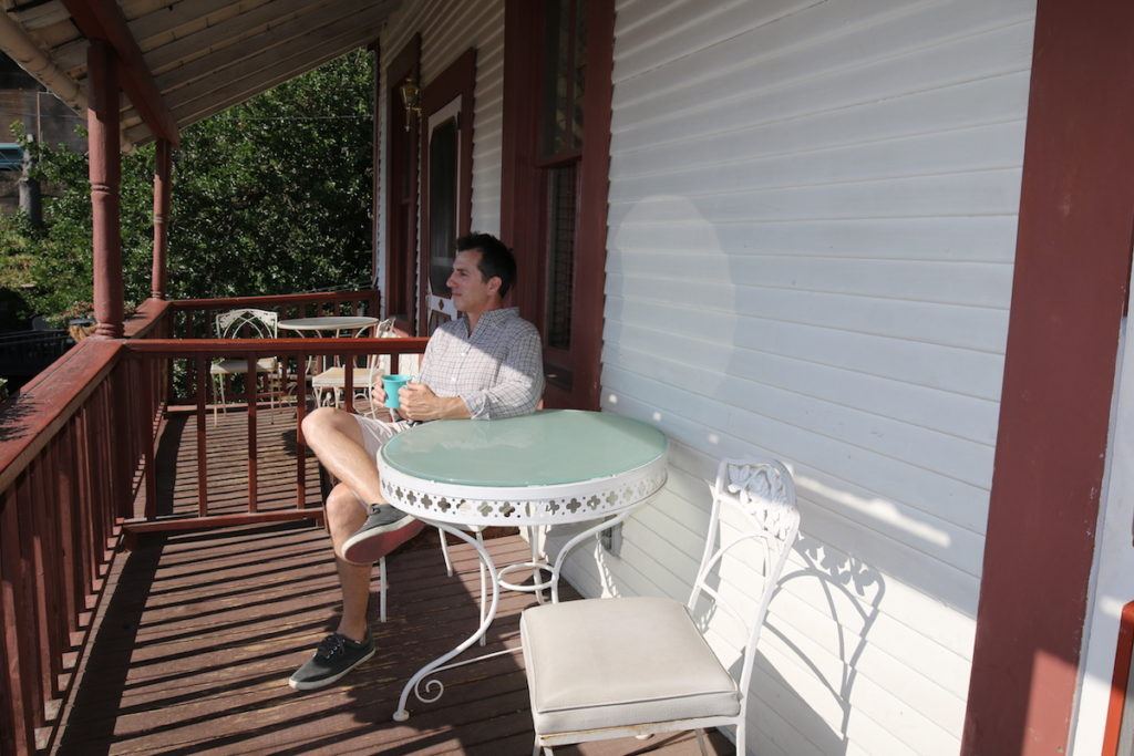 Mike on Veranda at Ghost City Inn by MikesRoadTrip.com