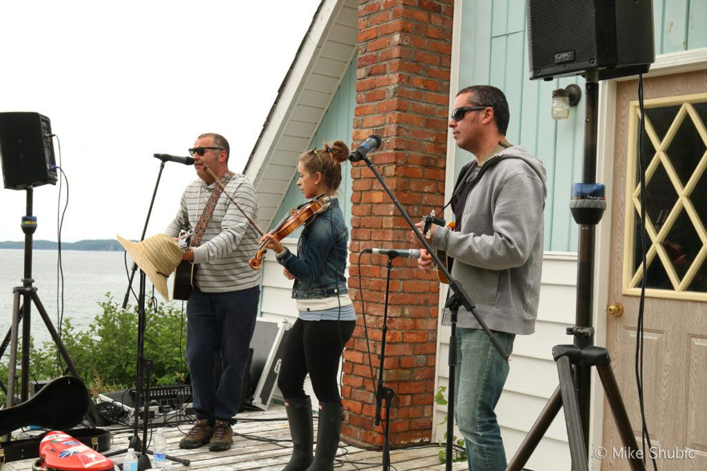 Trio performing at The Gathering during Chef Hike