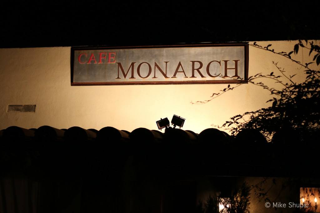 Cafe Monarch sign at night