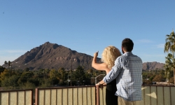 Couple lookingat Mountain from Hotel Valley Ho