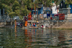 Ladies cleaning clothes on copy