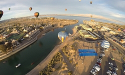 Quad-copter view of hot air balloons