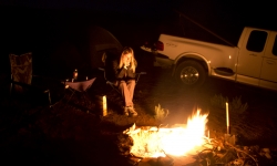 Sitting by campfire in Page, AZ Sitting by campfire in Page, AZ