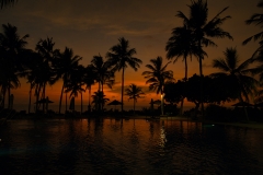 Taj-Benota-pool-at-sunset