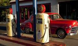 50s car at 50s gas station