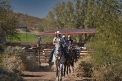 Riders-leaving-corral-with-golf-course-by-Mike-Shubic