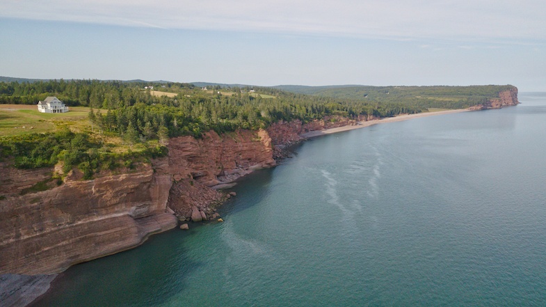 Bay of Fundy cliff is one of the many scenic roads in Canada - aerial shot by MikesRoadTrip.com