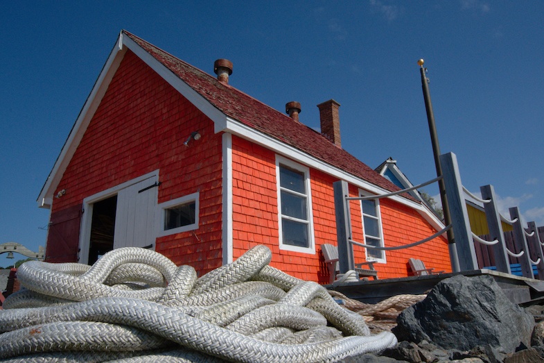 Red boat house in Pictou Nova Scotia by MikesRoadTrip.com