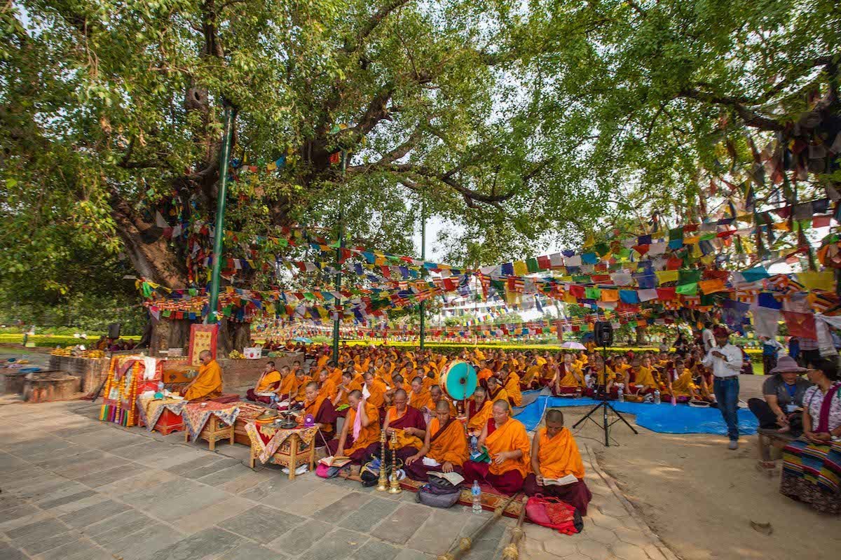 Lumbini monks pray by Dee of MikesRoadTrip.com