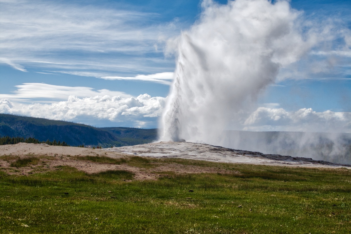 Visit Yellowstone National park in Wyoming and see Old Faithful Geyser. Photo by: Mike Shubic