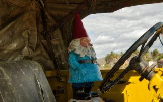 Travelocity Roaming Gnome driving a truck in Los Cabos. Photo by: Mike Shubic of MikesRoadTrip.com