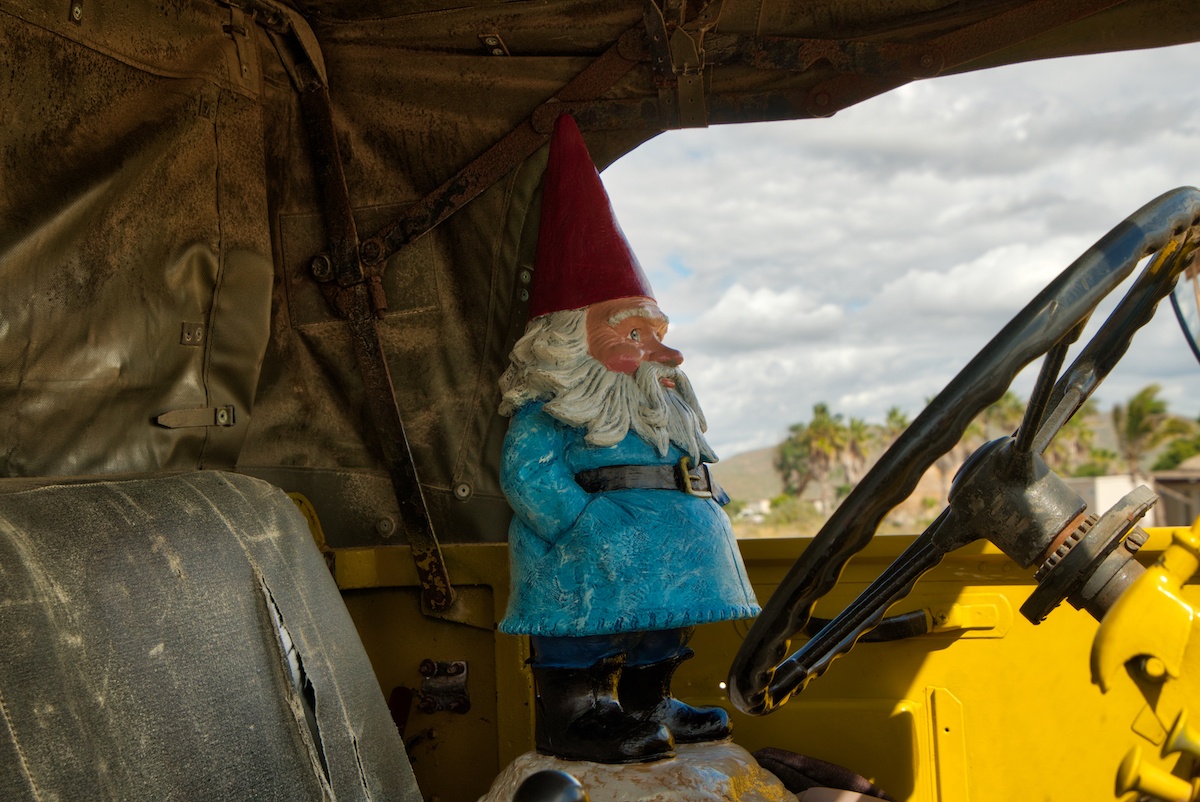 Travelocity Roaming Gnome driving a truck in Los Cabos. Photo by: Mike Shubic of MikesRoadTrip.com