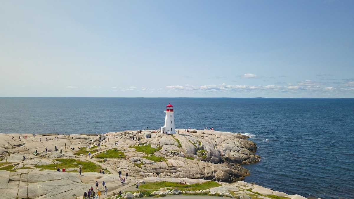 Travel to Nova Scotia to see Peggy's Cove Lighthouse. Photo by: MikesRoadTrip.com