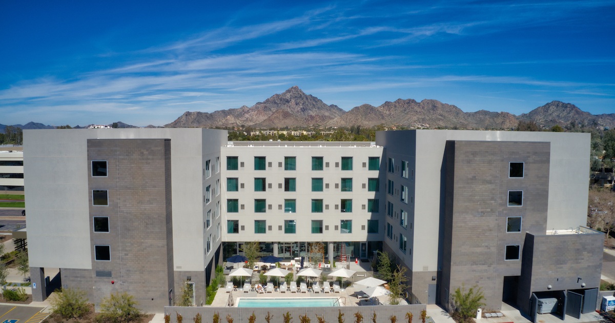 AC Hotel Phoenix with Camelback Mt. in background by MikesRoadTrip.com