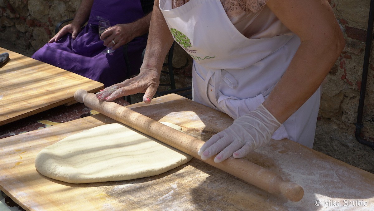 Cook in Tuscany making bread by MikesRoadTrip.com