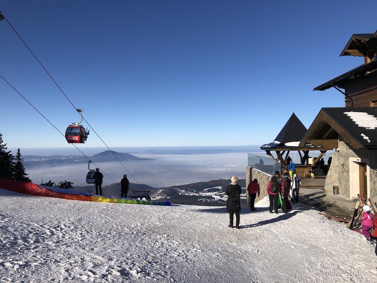 lodge and paraglider atop Poiana Brasov - Photo by: Mike Shubic of MikesRoadTrip.com