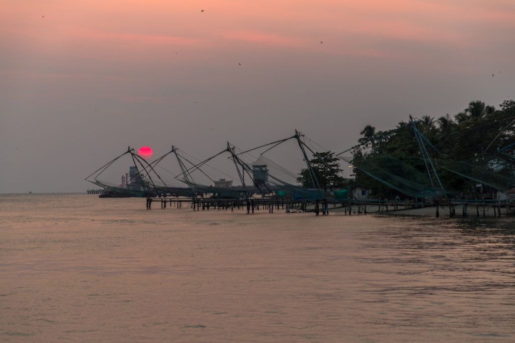 Fishing nets at sunset in Kochi