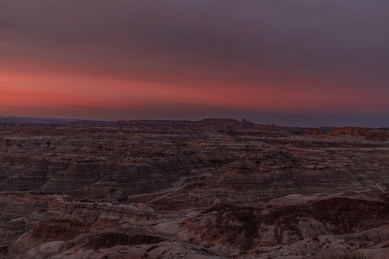 Badlands in New Mexico at sunset by Mihaela of WorldTravelBug.com