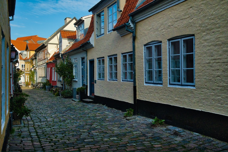 Aalborg colorful cobblestone street - MikesRoadTrip.com