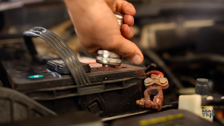 clean your battery posts before a road trip