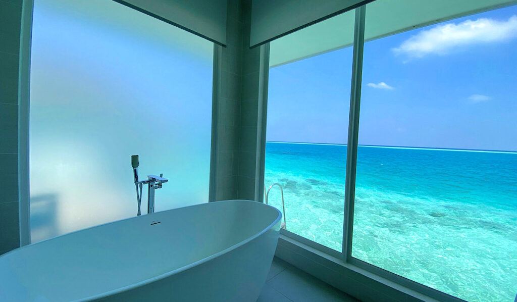 bathroom with a view of the maldives