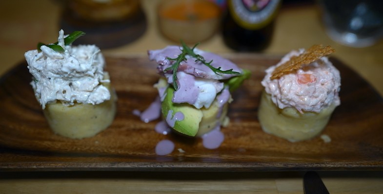 Causa Trio - Causa cakes topped with shrimp, chicken and octopus an appetizer at Llama Restaurant - Photo by Mike Shubic